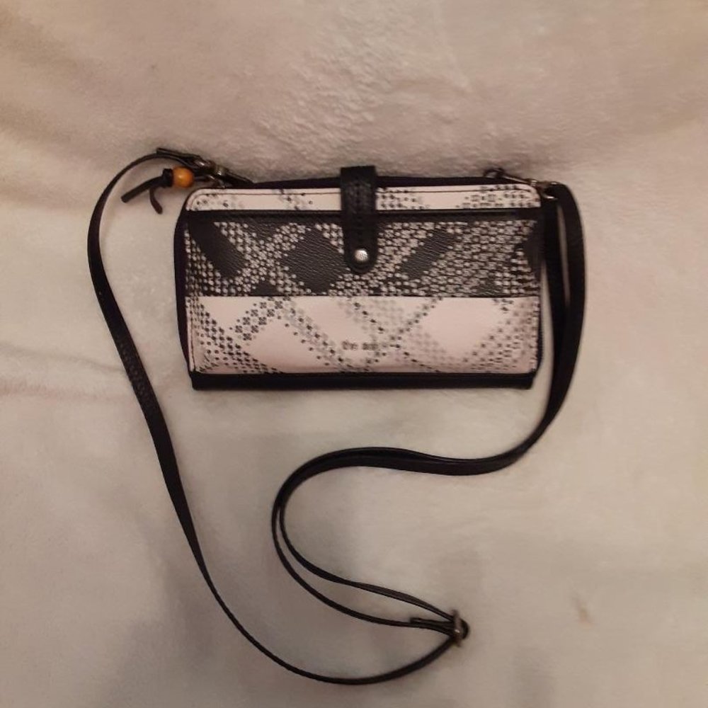 The Sak cream and black crossbody/wallet purse